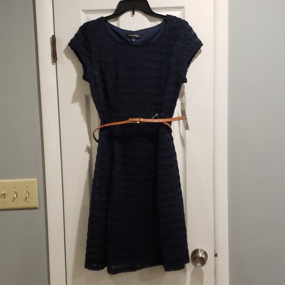Tags on. Navy short sleeved belted dress